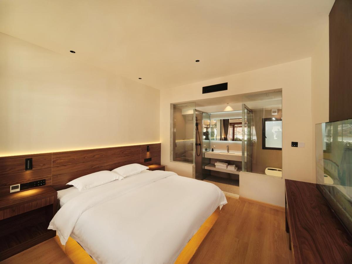 Xiluxiaoxie Saturday 3Nights Airport Free Transfer Apartment ลี่เจียง ภายนอก รูปภาพ